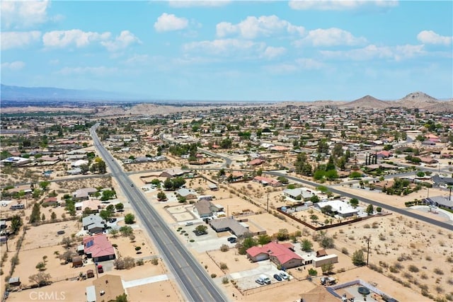 drone / aerial view featuring a mountain view