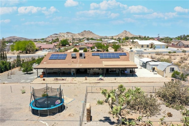 bird's eye view with a mountain view and a residential view