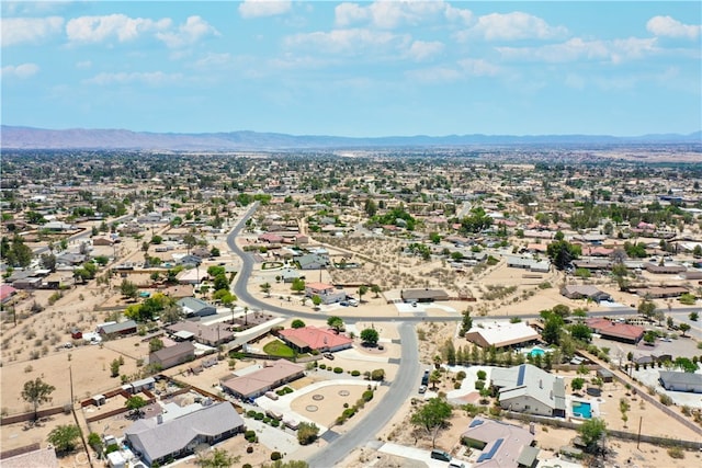 birds eye view of property with a residential view and a mountain view