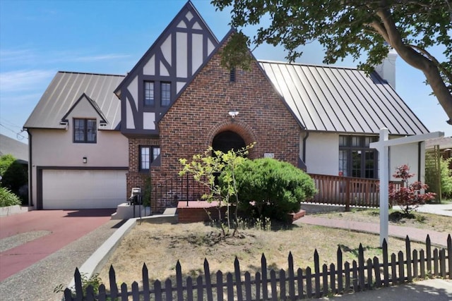 tudor home with a garage