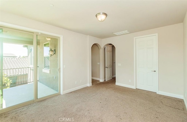 empty room featuring carpet floors