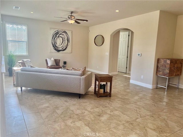 living room featuring ceiling fan