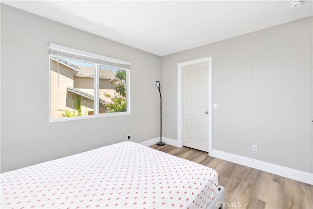 bedroom featuring light wood-type flooring