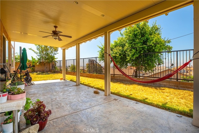 view of patio featuring ceiling fan