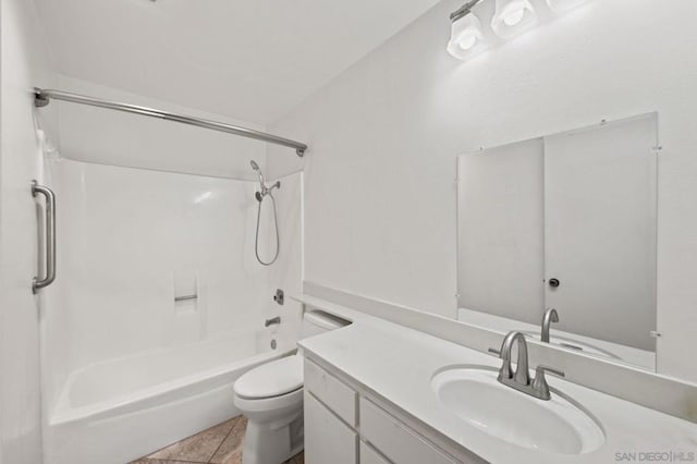 full bathroom with tub / shower combination, vanity, toilet, and tile patterned floors