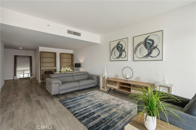 living room with hardwood / wood-style floors