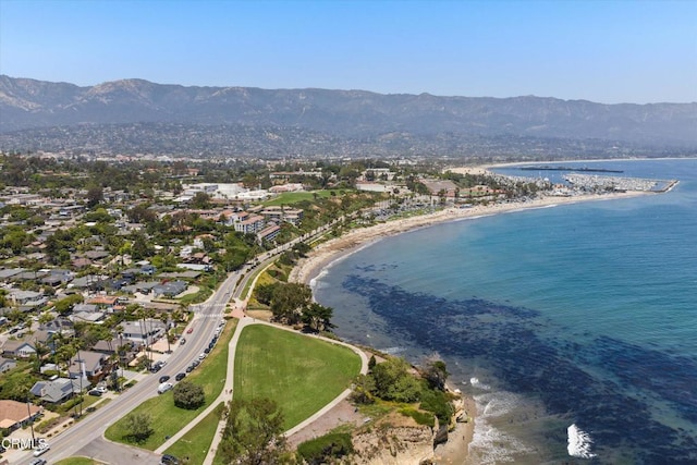 aerial view featuring a water and mountain view