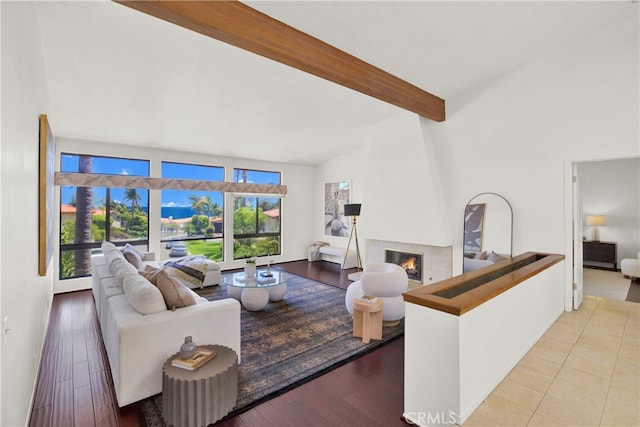 32701 Via Palacio, Rancho Palos Verdes, CA 90275 - living room with beam ceiling, a large fireplace, and wood finished floors