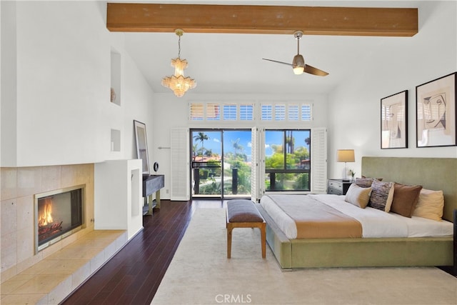 32701 Via Palacio, Rancho Palos Verdes, CA 90275 - bedroom featuring high vaulted ceiling, beamed ceiling, wood finished floors, a fireplace, and access to outside