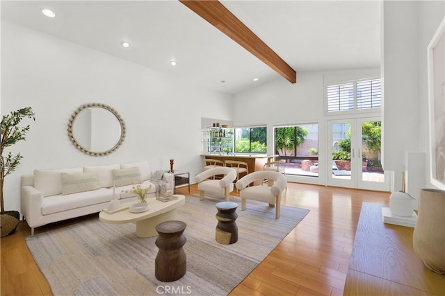 32701 Via Palacio, Rancho Palos Verdes, CA 90275 - living room with beam ceiling, wood finished floors, high vaulted ceiling, recessed lighting, and french doors