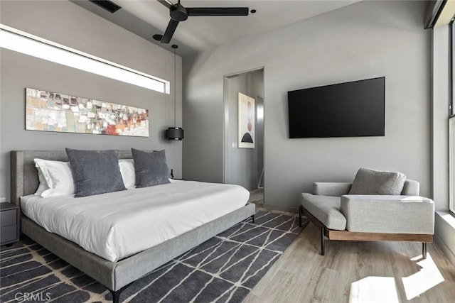 bedroom featuring ceiling fan and hardwood / wood-style floors