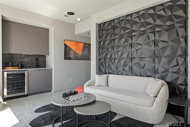 living room with sink and beverage cooler