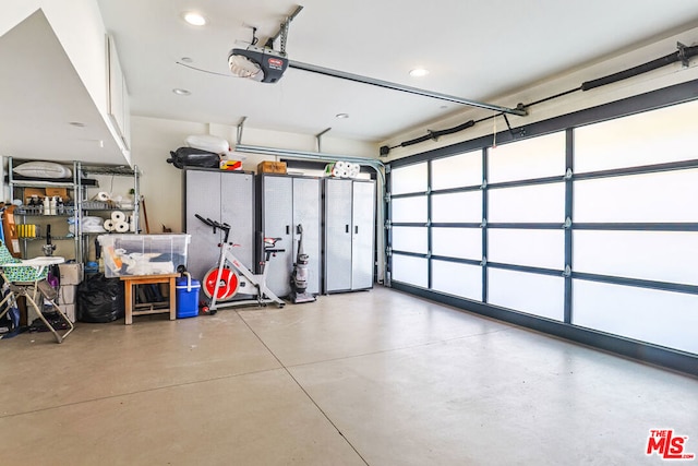 garage featuring a garage door opener