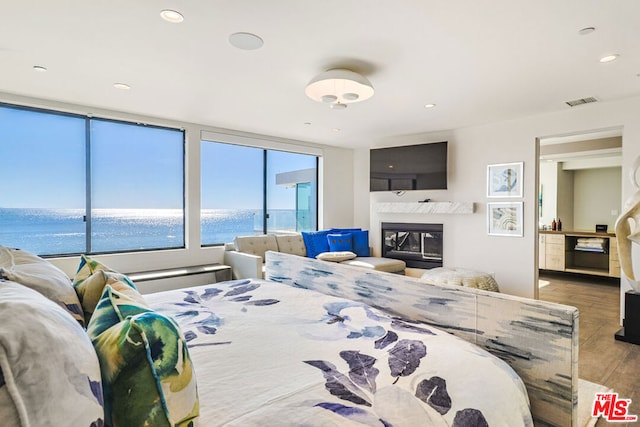 bedroom with hardwood / wood-style floors