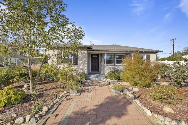 view of front of property featuring a patio area