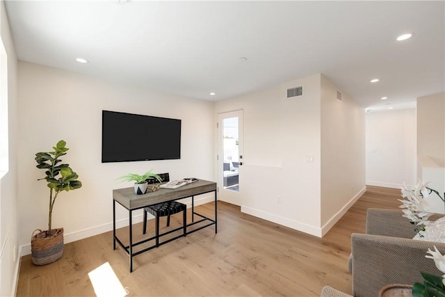 living room featuring light wood-type flooring