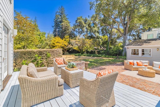 deck with an outdoor hangout area