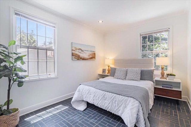 bedroom featuring crown molding