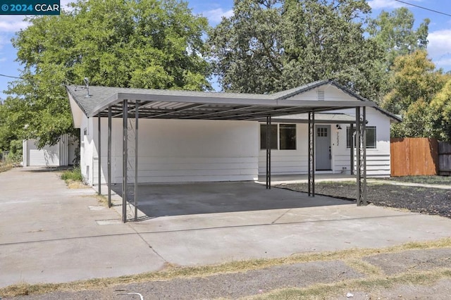 view of front of house with a carport