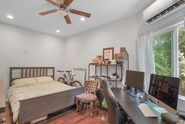 bedroom featuring a wall mounted air conditioner, ceiling fan, and dark hardwood / wood-style floors