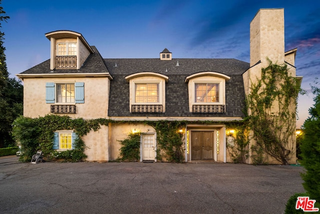 view of french country style house