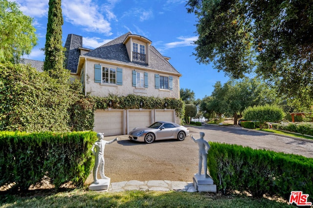 exterior space with a garage