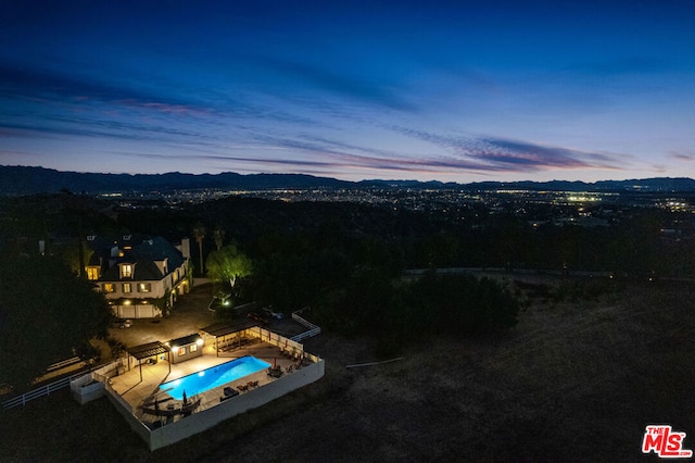 view of aerial view at dusk