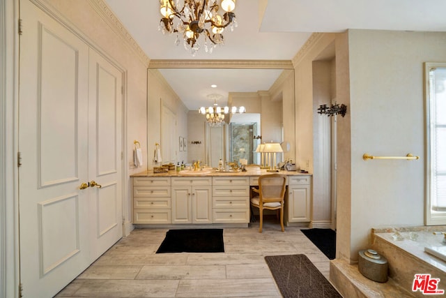 bathroom featuring vanity, an inviting chandelier, a washtub, and hardwood / wood-style floors