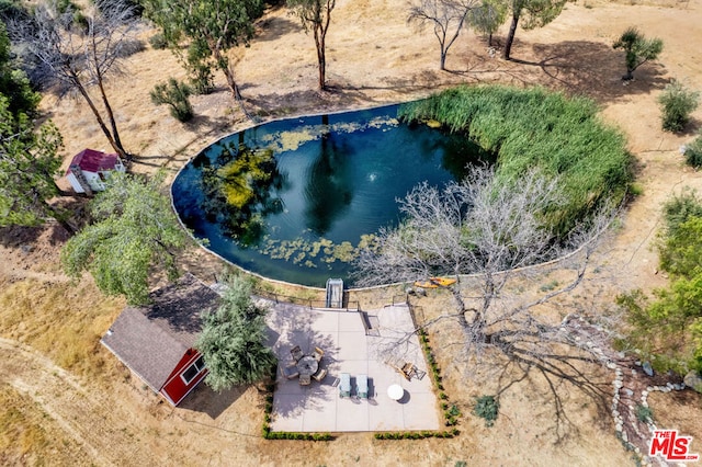 drone / aerial view with a water view