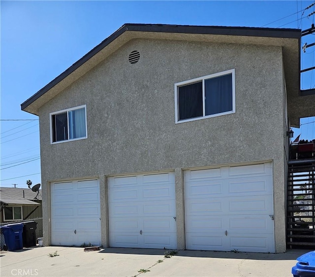 exterior space featuring a garage