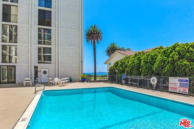 view of pool with a patio