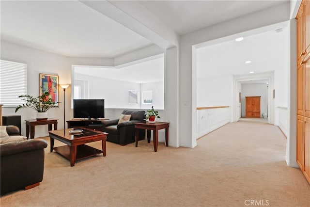 living area with light colored carpet