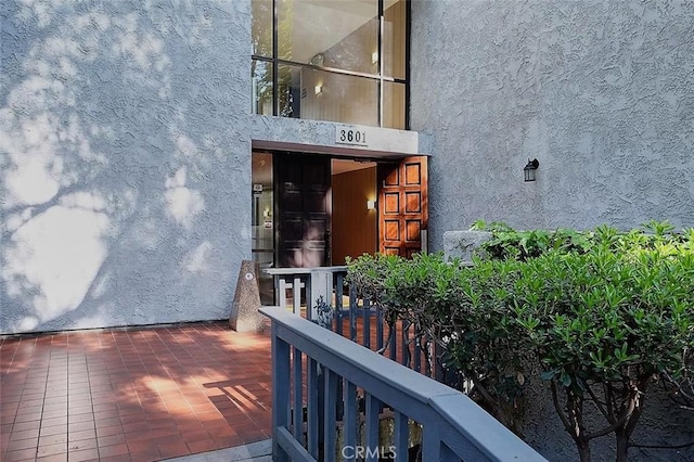 3601 W Hidden Ln Unit 121, Rolling Hills Estates, CA 90274 - property entrance featuring stucco siding
