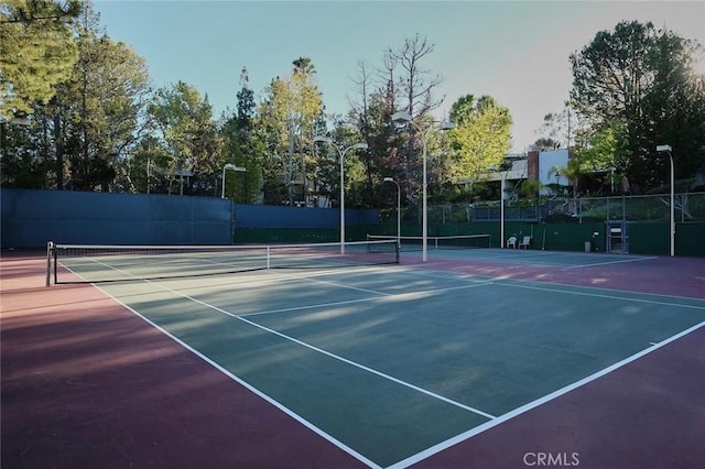 3601 W Hidden Ln Unit 121, Rolling Hills Estates, CA 90274 - view of tennis court featuring community basketball court