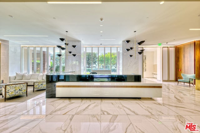 kitchen featuring a wall of windows