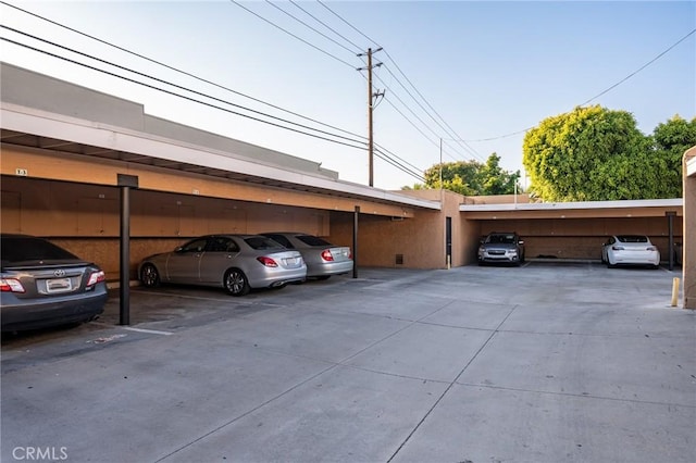 view of parking with a carport