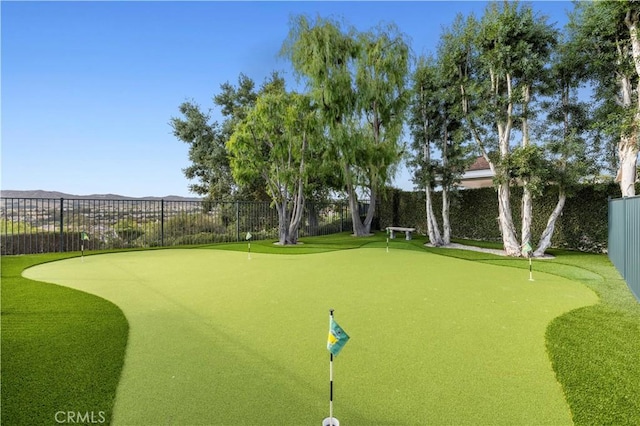 view of home's community with a fenced backyard