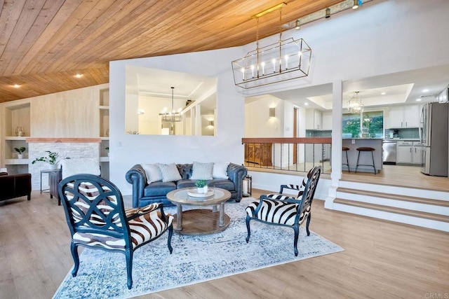 living room featuring light hardwood / wood-style floors and wooden ceiling