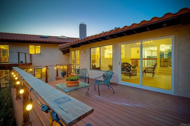 view of deck at dusk