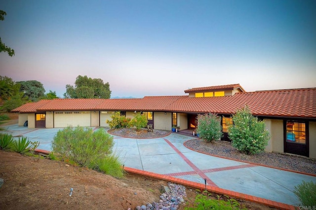 view of front of home with a garage