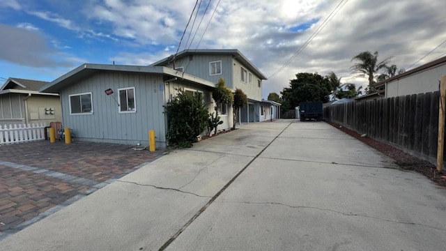 view of side of home with a patio