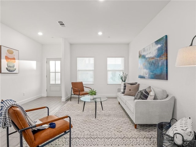 living room with light hardwood / wood-style floors