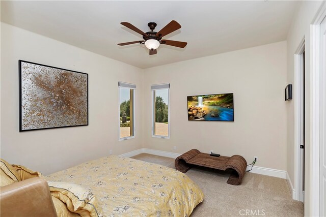 bedroom featuring ceiling fan and carpet flooring