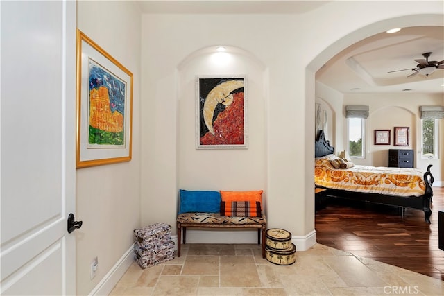 hallway with wood-type flooring