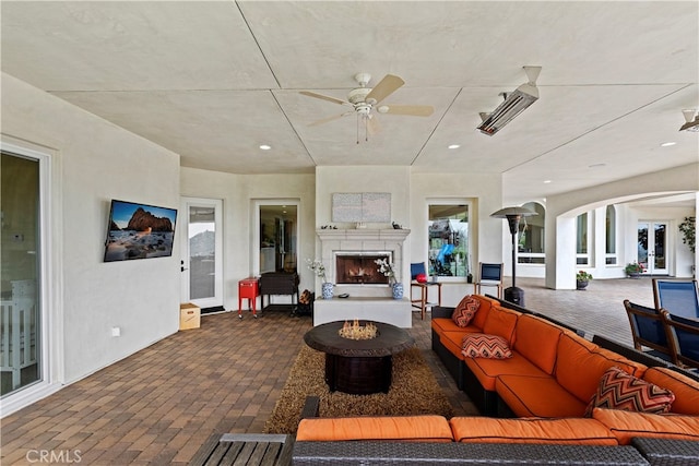 living room with ceiling fan