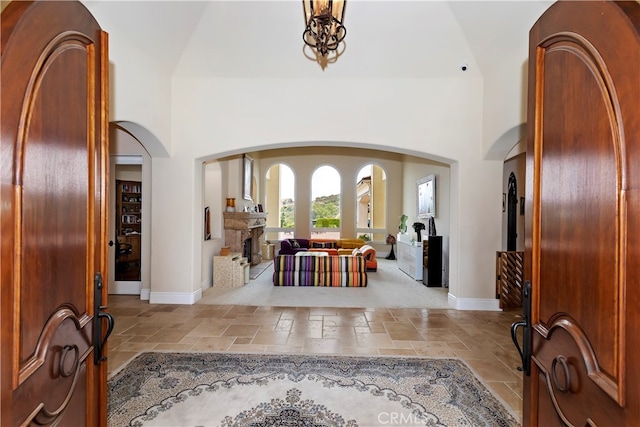 view of carpeted entrance foyer