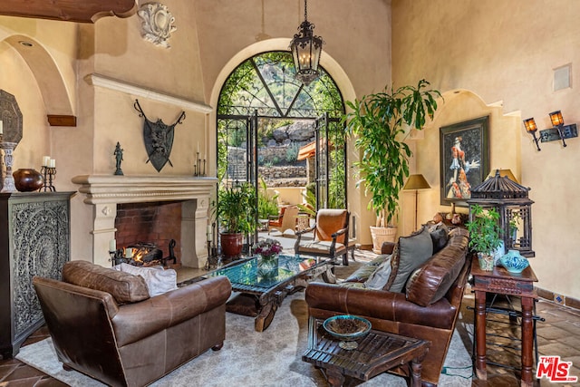 living room featuring a high ceiling