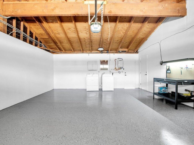 garage featuring independent washer and dryer