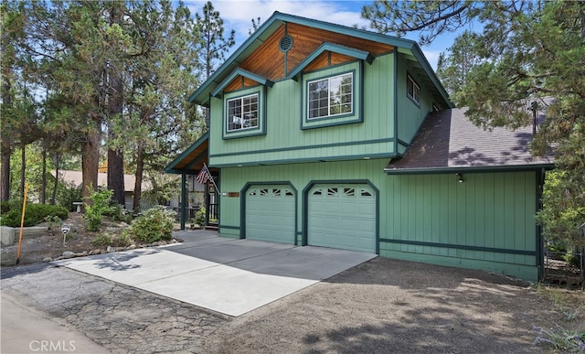 view of property exterior with a garage