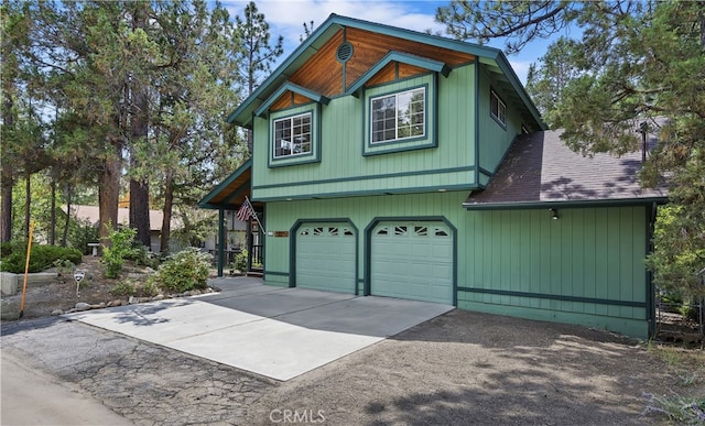 view of property exterior with a garage